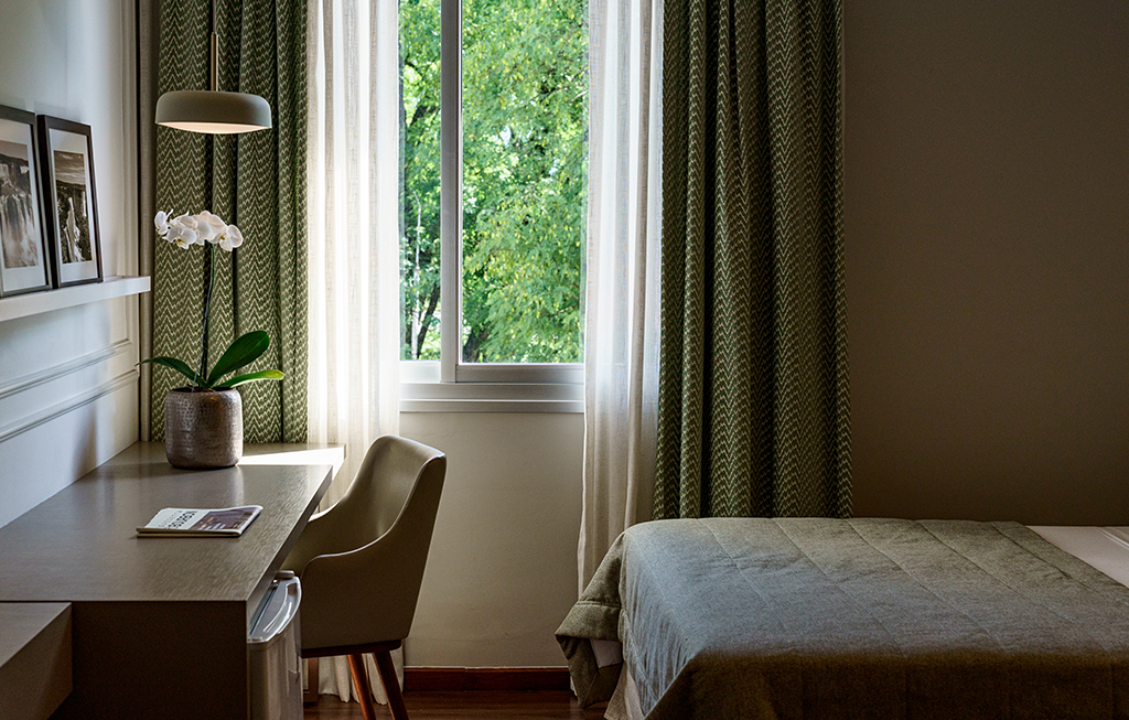 Superior vista jardim - duas camas de casal